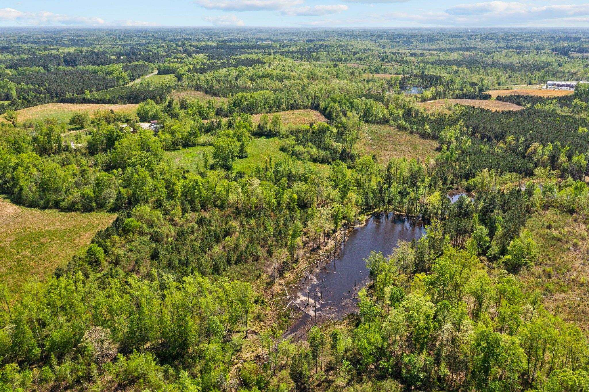 0 Salem Road Oxford, NC 27565 - Photo 32 of 42 an aerial view of residential houses with outdoor space and trees