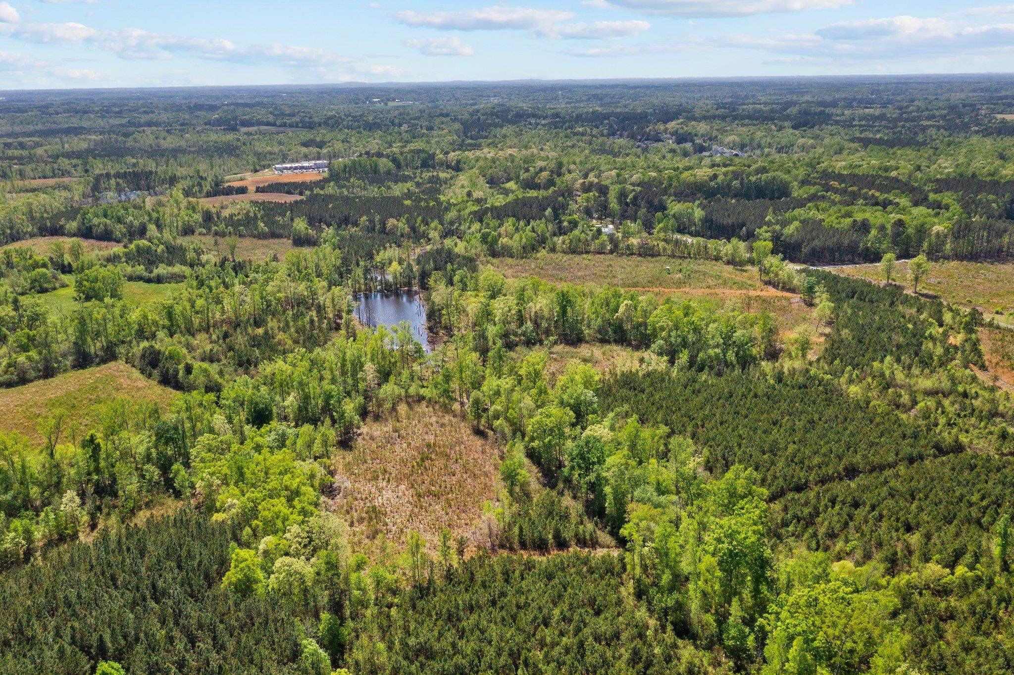 0 Salem Road Oxford, NC 27565 - Photo 35 of 42 an aerial view of residential houses with outdoor space and trees