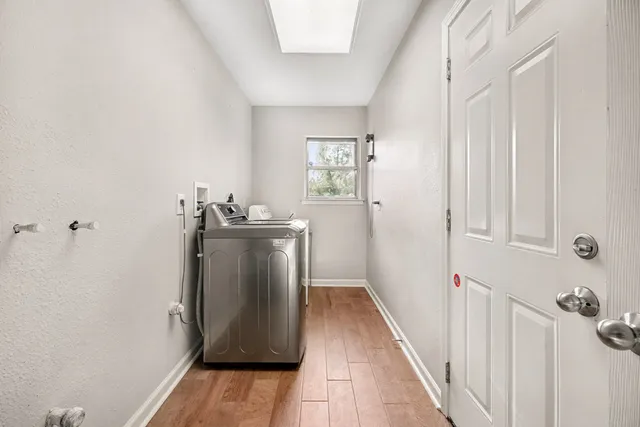 a kitchen with stainless steel appliances granite countertop a stove and a sink