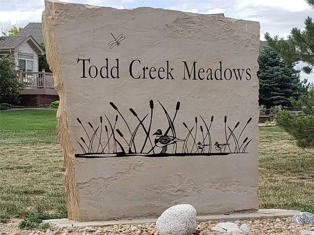 a sign that is on the wall of building