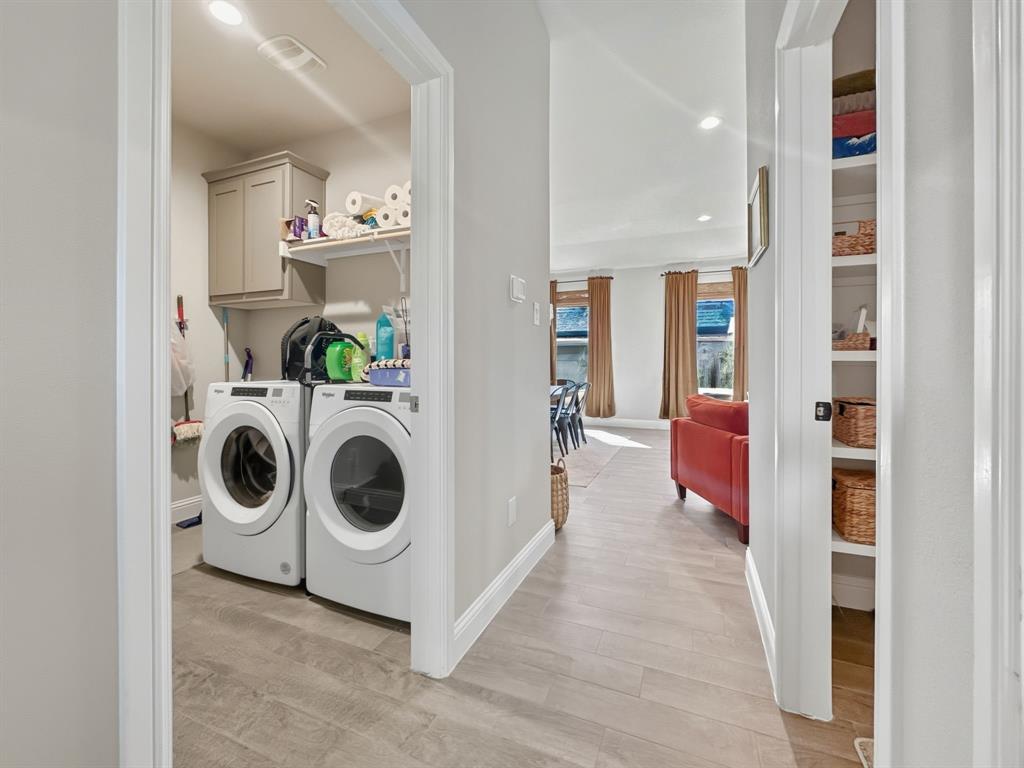 2216 Redwing Drive Denton, TX 76205 - Photo 29 of 38 a utility room with dryer and washer