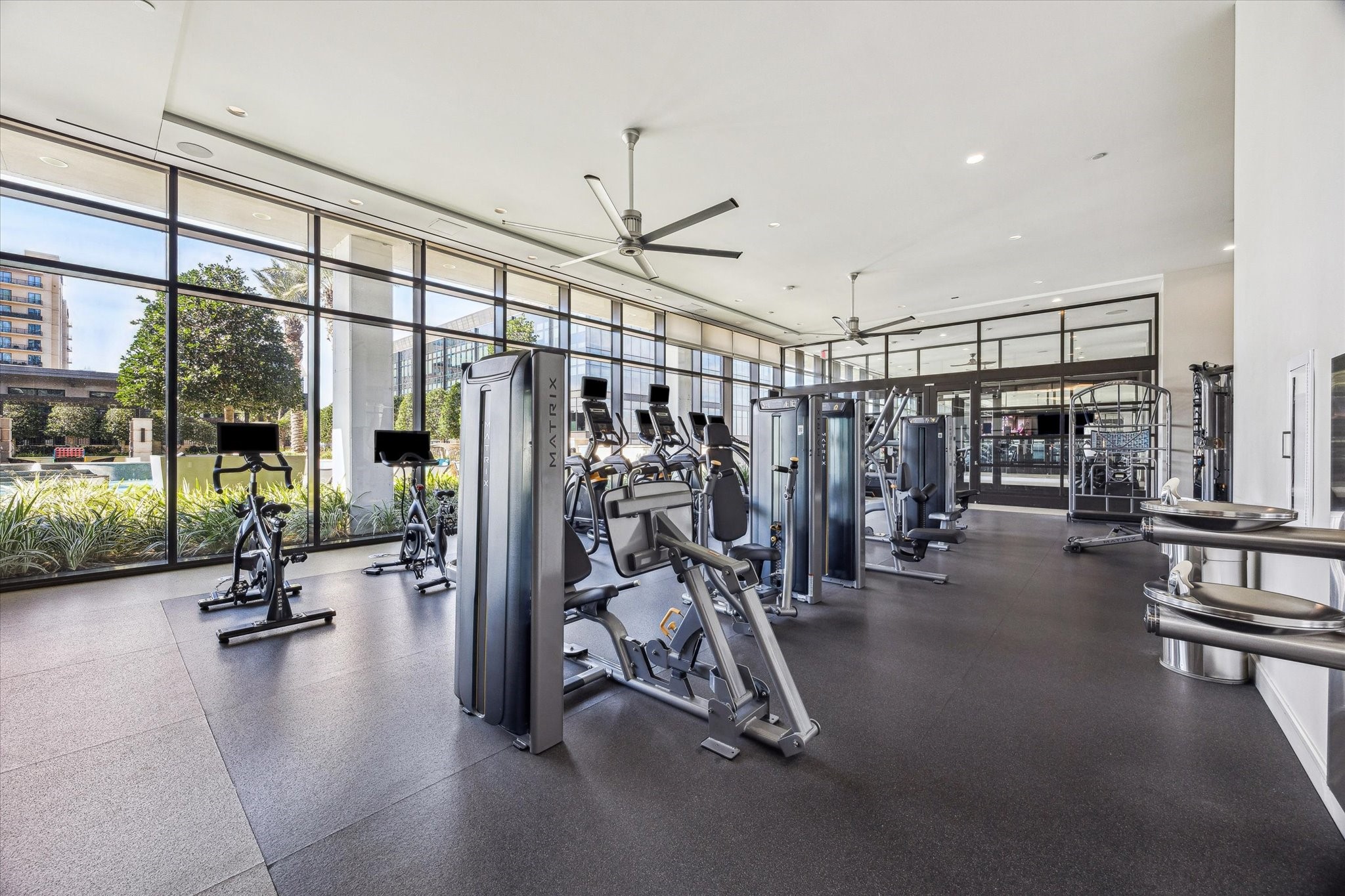9757 Katy Freeway, Unit 822 Houston, TX 77024 - Photo 20 of 30 a view of a room with gym equipment