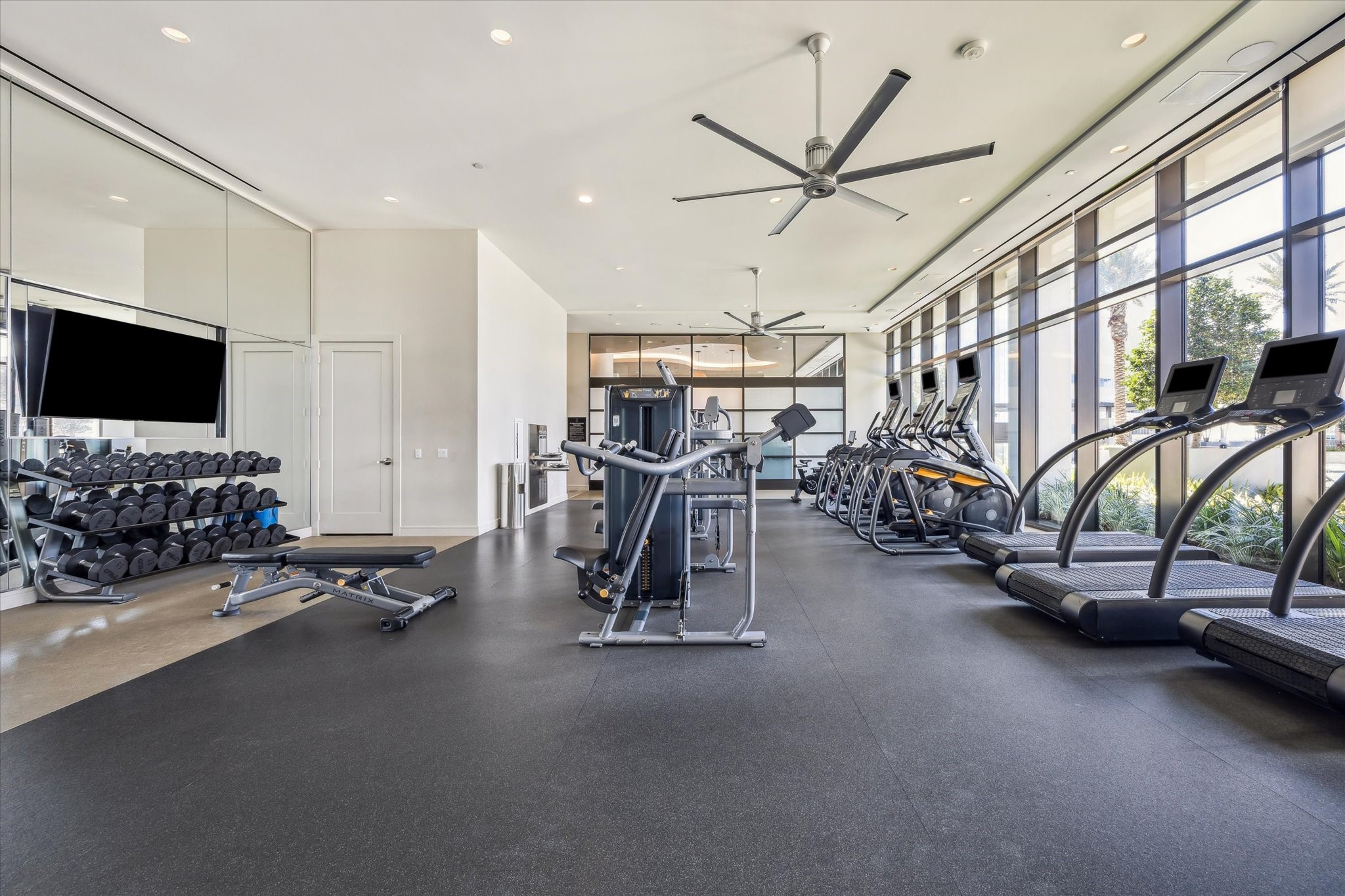 9757 Katy Freeway, Unit 822 Houston, TX 77024 - Photo 21 of 30 a view of a room with gym equipment