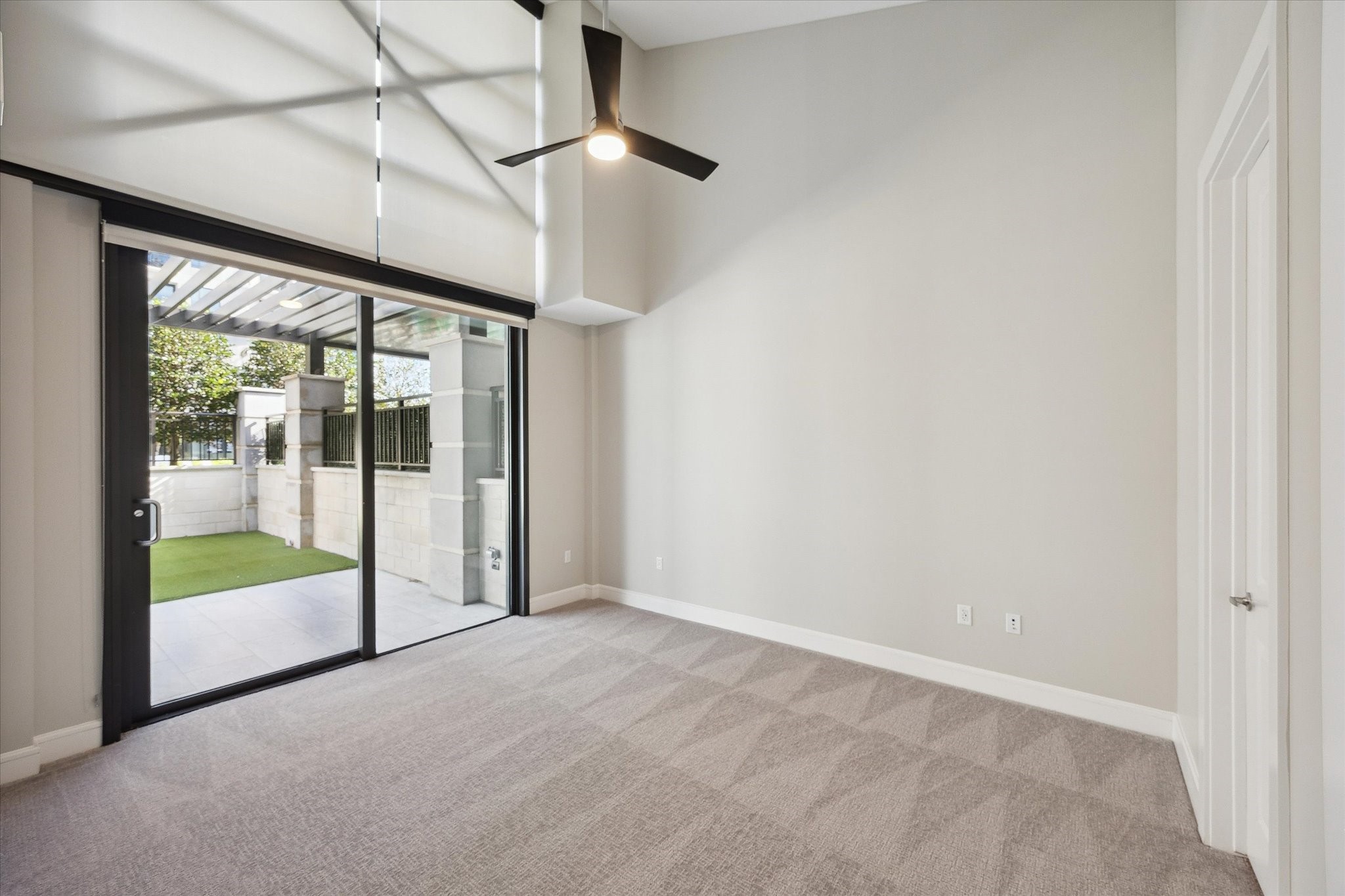 9757 Katy Freeway, Unit 822 Houston, TX 77024 - Photo 9 of 30 a view of an empty room with a balcony