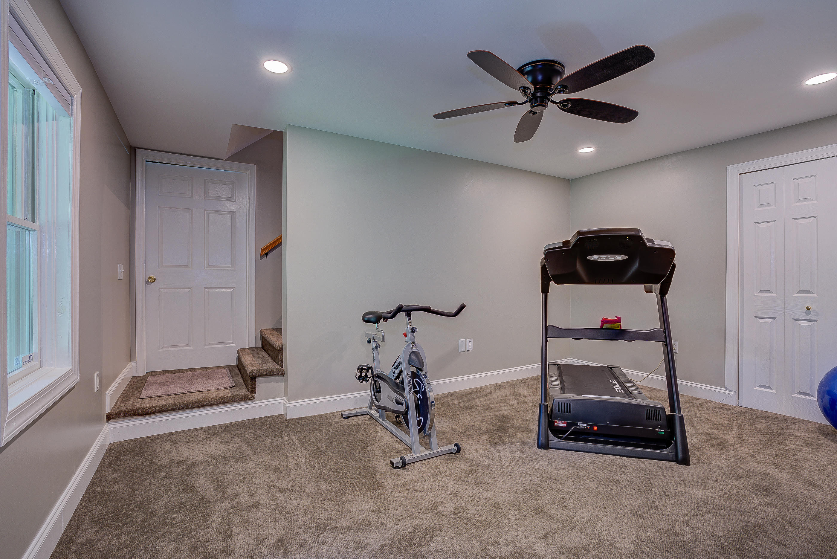 2700 New Ridge Road Elliston, VA 24087 - Photo 22 of 27 a room with gym equipment and a window