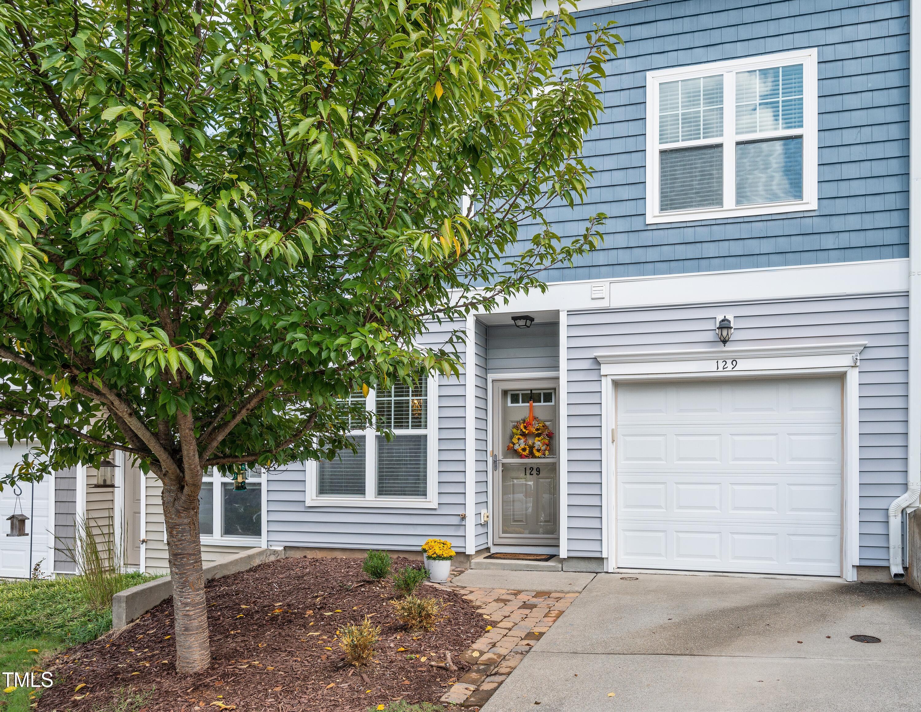 129 Deacon Ridge Street Wake Forest, NC 27587 - Photo 2 of 27 129 Deacon Ridge Street Garage Angle