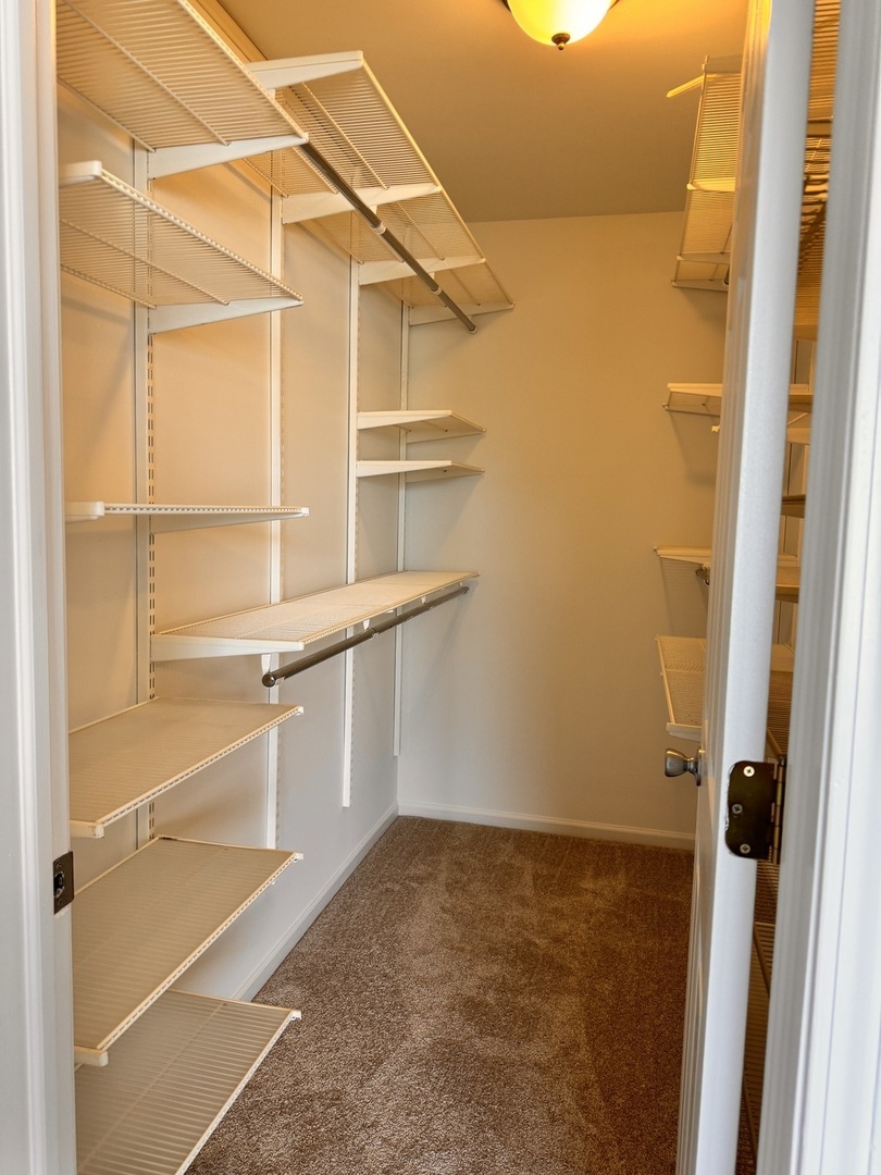 1617 Spaulding Road Bartlett, IL 60103 - Photo 6 of 9 a view of a room with rack on the wall