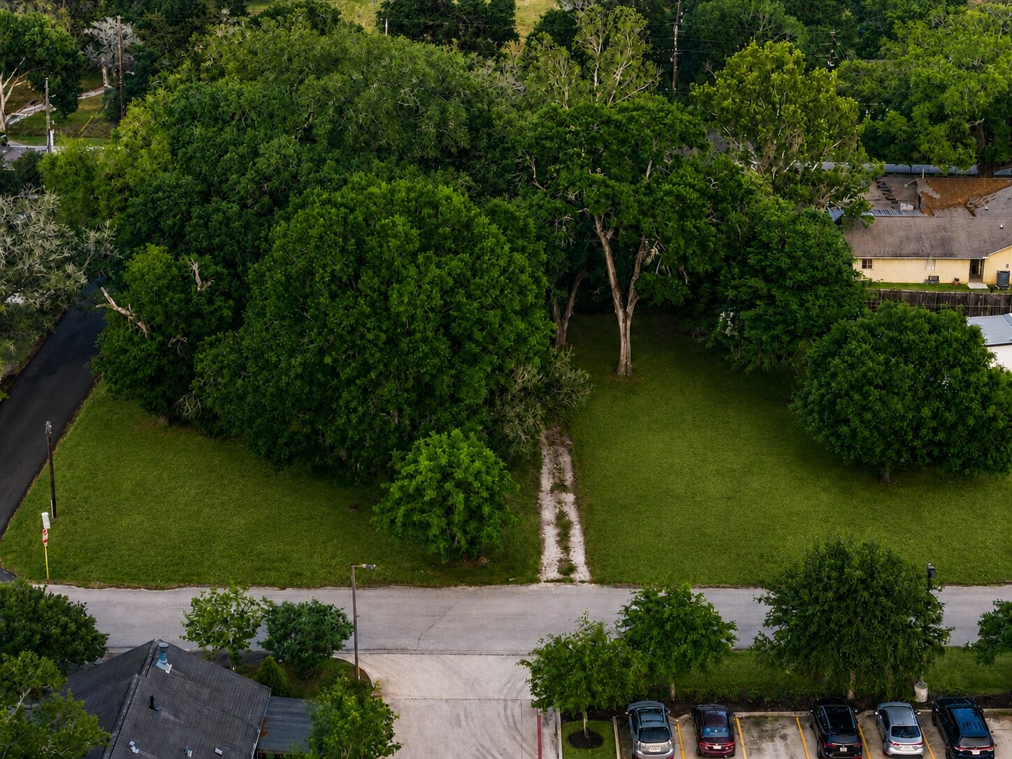 8407 Wilson Street Fulshear, TX 77441 - Photo 5 of 16 This aerial view shows the corner location which provides options for entrance on Wilson Street or on 2nd
Street. With two street frontages you’re not boxed into a single orientation. You can position the home or building for better curb appeal, natural light, and flow. For a residence, that might mean a more private backyard or a side-entry garage. For an office, it allows for a more prominent, intentional layout.