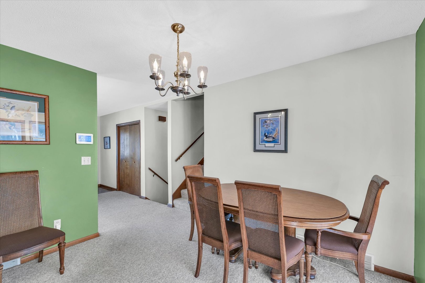 586 Hazelcrest Place Rantoul, IL 61866 - Photo 12 of 47 a view of a dining room with furniture