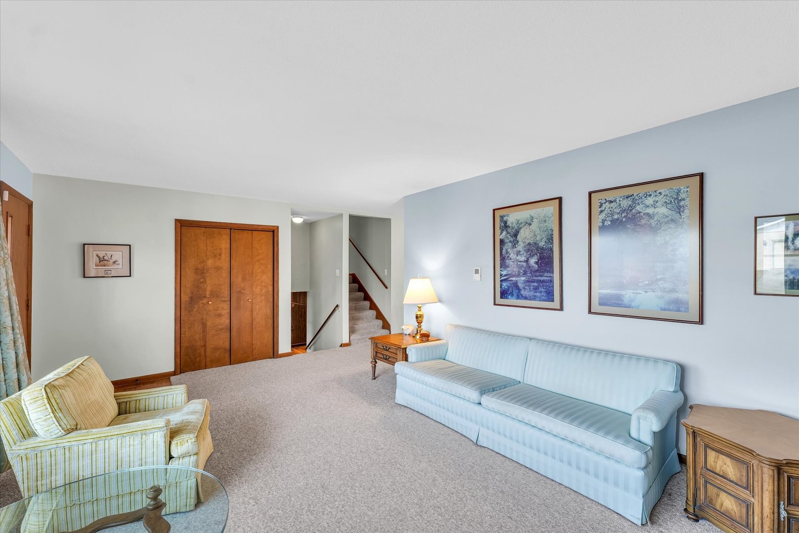 586 Hazelcrest Place Rantoul, IL 61866 - Photo 21 of 47 a living room with furniture and a couch
