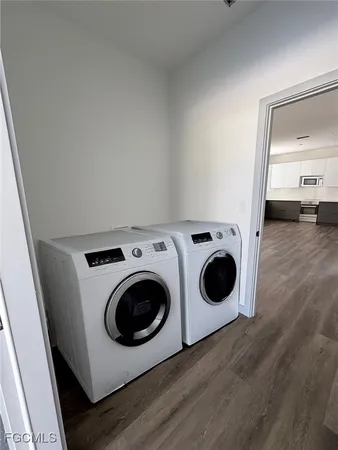 a utility room with dryer and washer