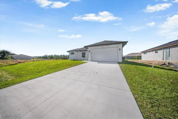 a view of a garden with an outdoor space