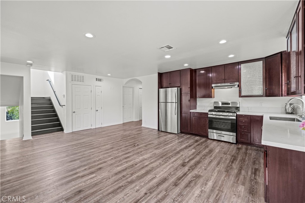 28637 Chiquito Canyon Road Castaic, CA 91384 - Photo 12 of 74 a kitchen with stainless steel appliances a refrigerator and a stove top oven