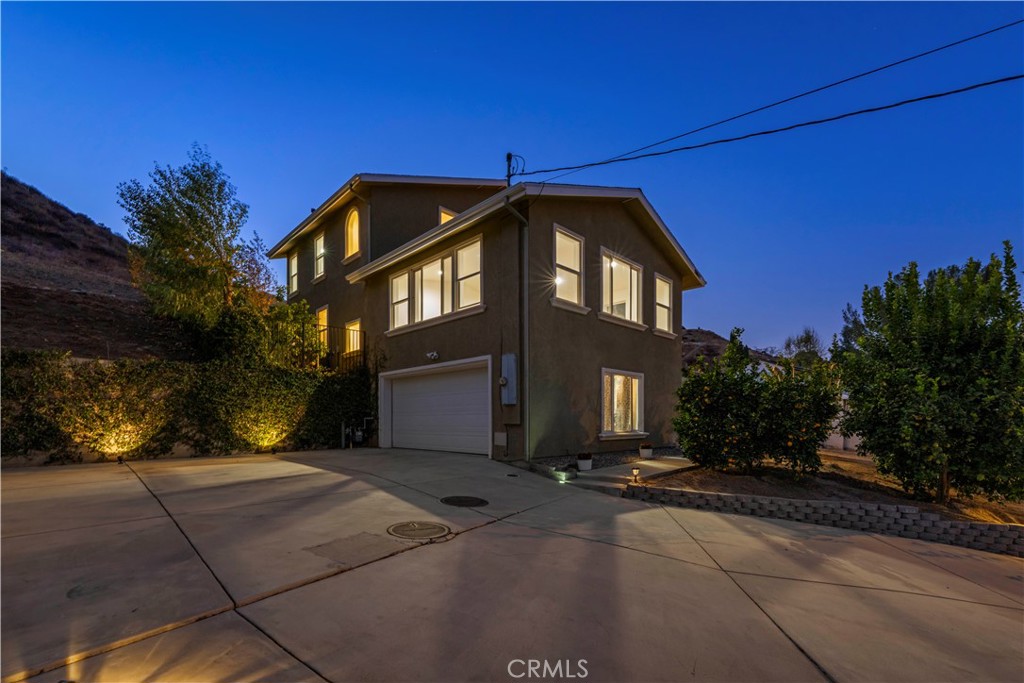 28637 Chiquito Canyon Road Castaic, CA 91384 - Photo 44 of 74 a front view of a house with a yard