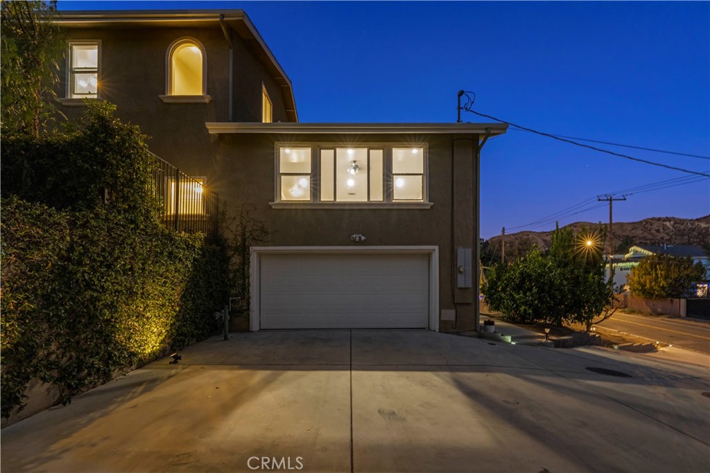 28637 Chiquito Canyon Road Castaic, CA 91384 - Photo 45 of 74 a view of a house with a yard