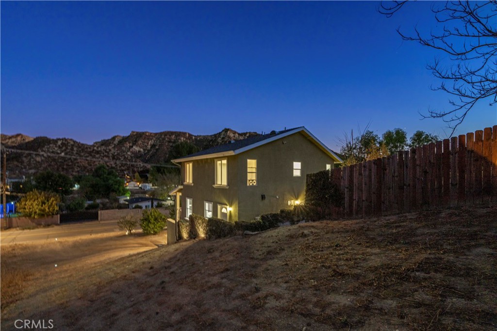 28637 Chiquito Canyon Road Castaic, CA 91384 - Photo 48 of 74 a view of a house with a yard