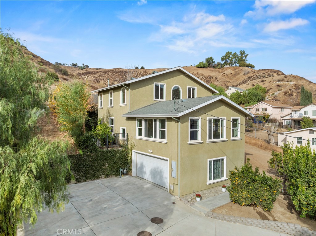 28637 Chiquito Canyon Road Castaic, CA 91384 - Photo 66 of 74 front view of a house with a yard