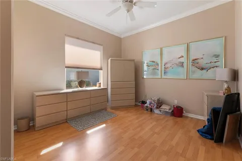 a room with furniture and a wooden floor