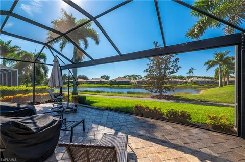 a view of a swimming pool with a patio
