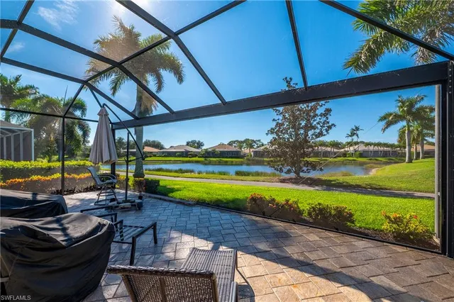 a view of a swimming pool with a patio