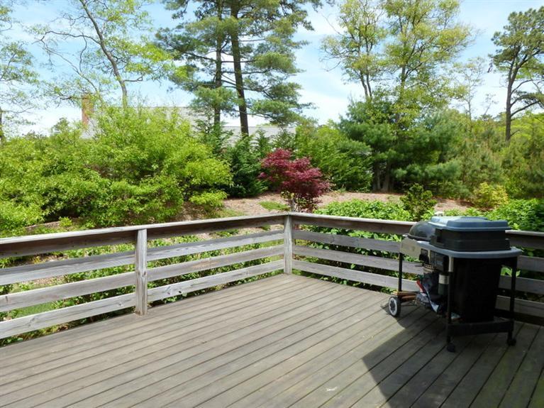 6 Penelope Road Bourne, MA 02532 - Photo 13 of 13 a view of a bench in a balcony