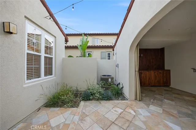 a view of entrance gate of house and yard