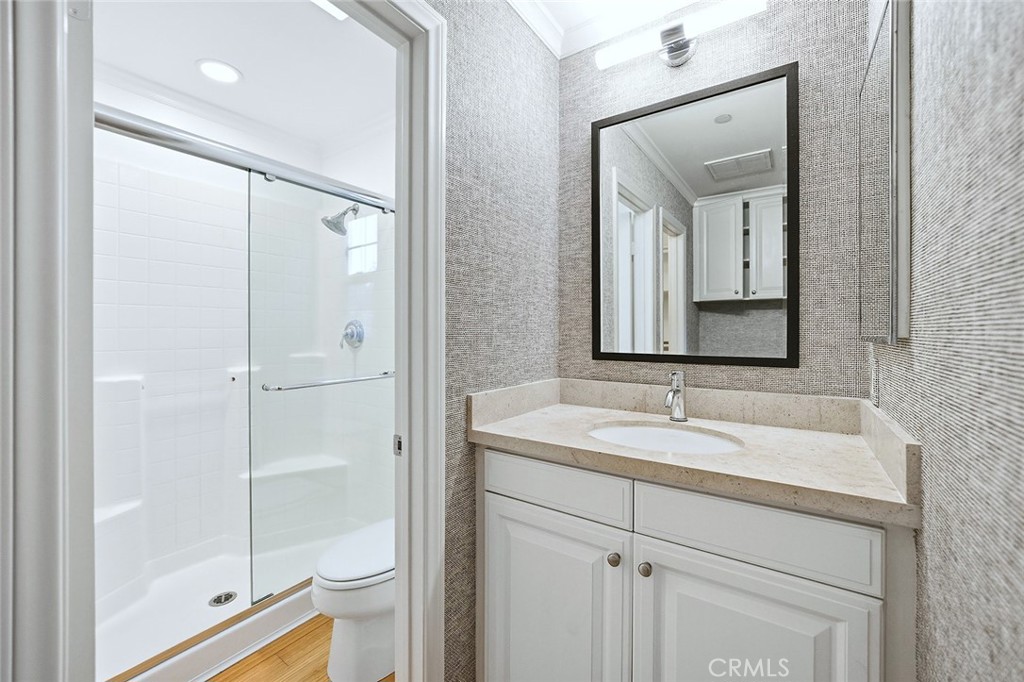 65 Greenhouse Irvine, CA 92603 - Photo 13 of 25 a bathroom with a sink and a mirror