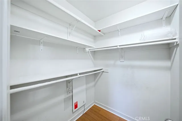 a view of an empty walk in closet