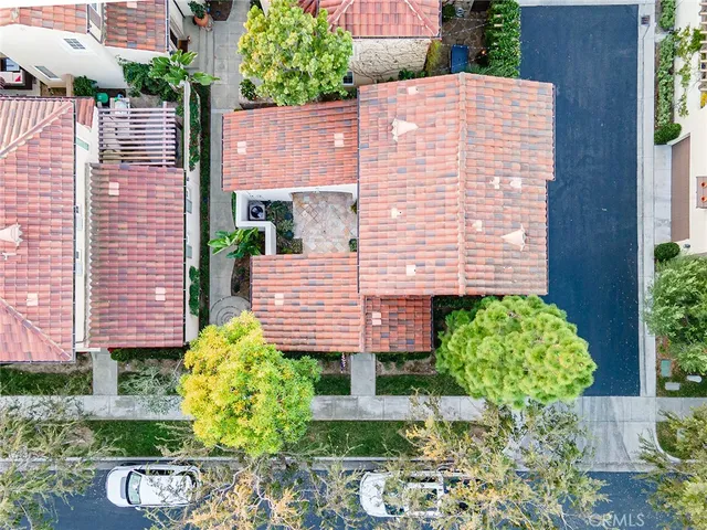 a view of a building with potted plants
