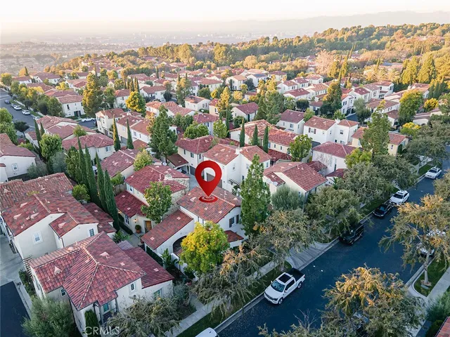 an aerial view of residential house with outdoor space
