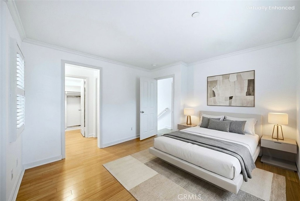 65 Greenhouse Irvine, CA 92603 - Photo 7 of 25 a bedroom with a bed and painting on the wall