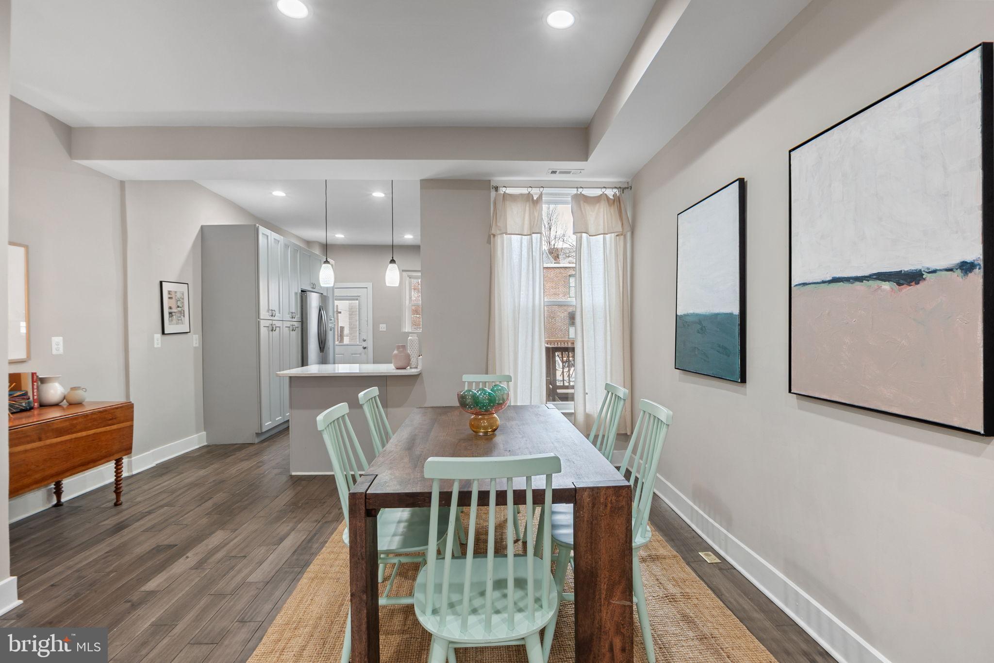 113 R Street Northeast Washington, DC 20002 - Photo 11 of 46 Modern dining space with artistic flair.