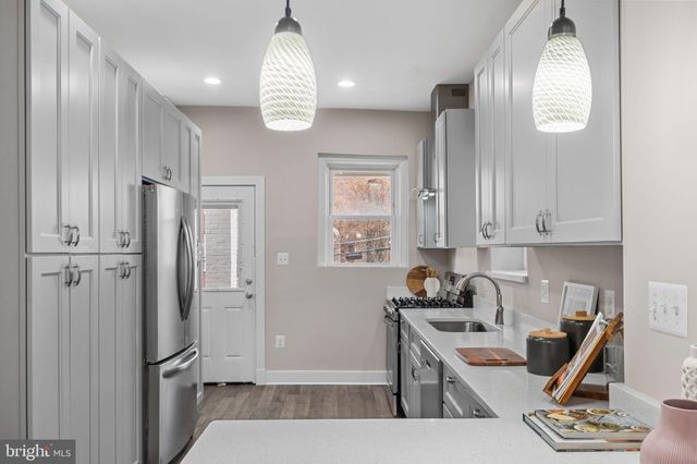 a view of a balcony with a floor to ceiling window