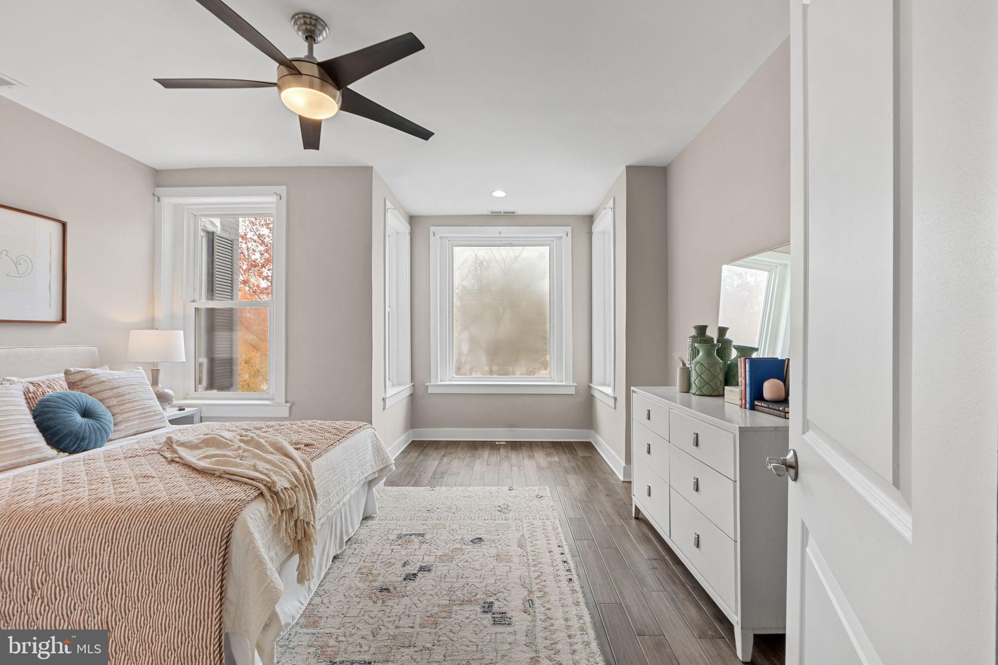 113 R Street Northeast Washington, DC 20002 - Photo 17 of 46 Master bedroom with natural light and charm