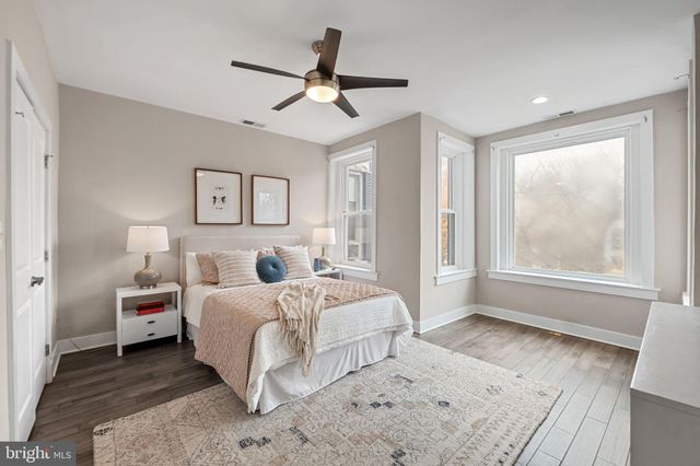 a bathroom with a toilet a sink and shower