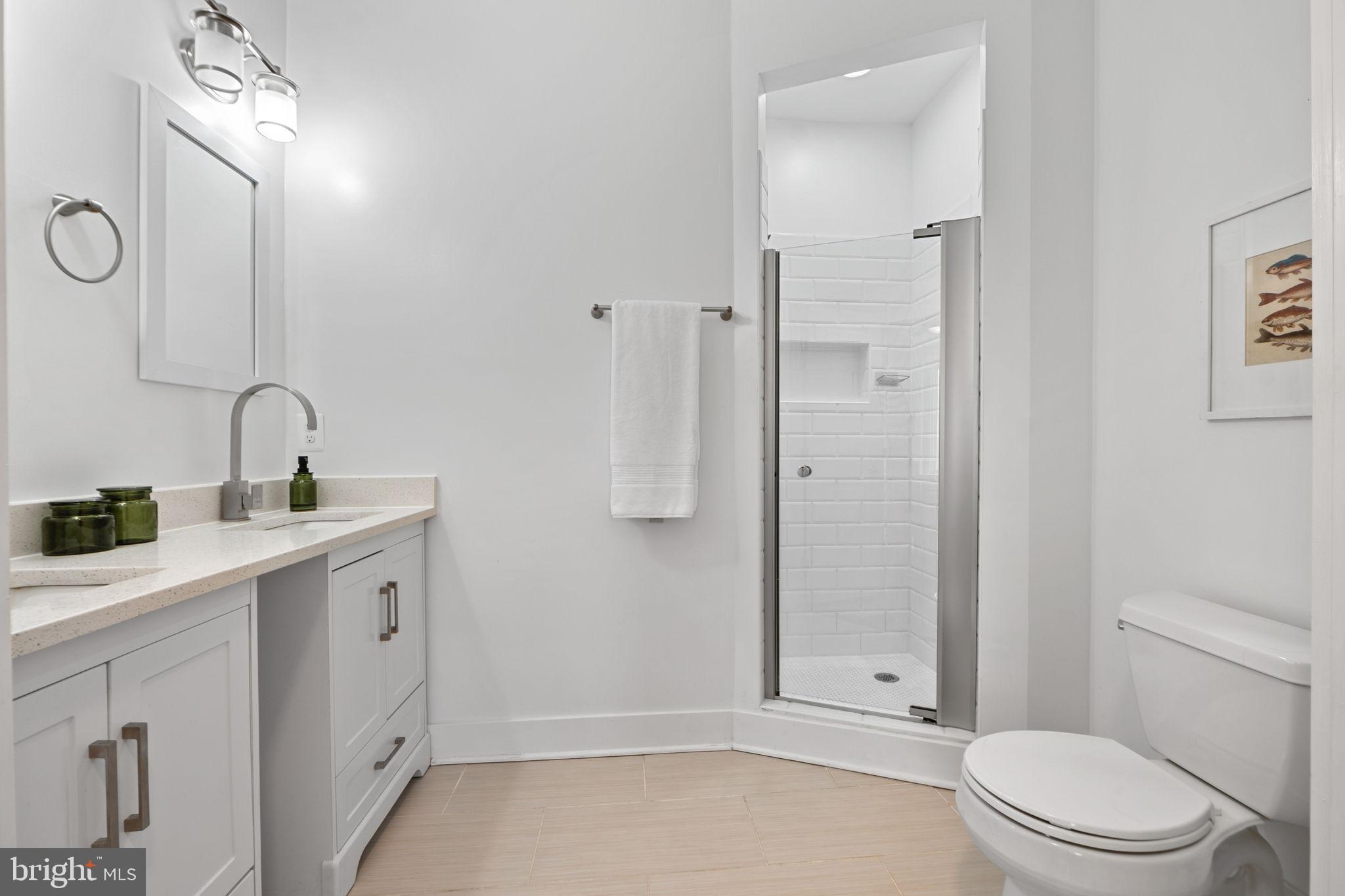 113 R Street Northeast Washington, DC 20002 - Photo 21 of 46 Sleek modern bathroom with clean lines.