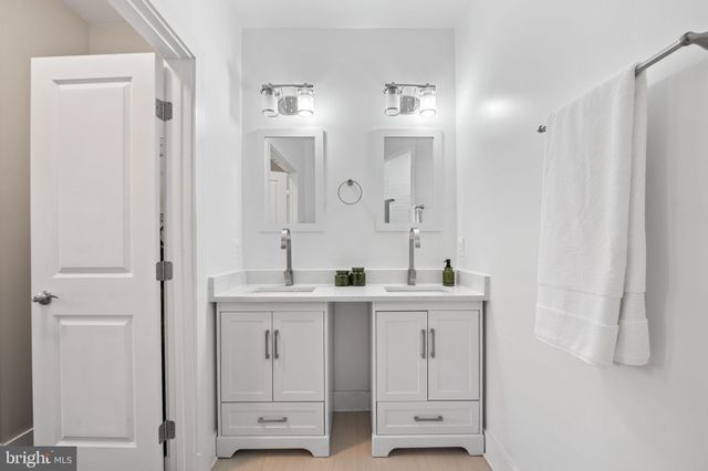 a bathroom with a sink toilet and bathtub