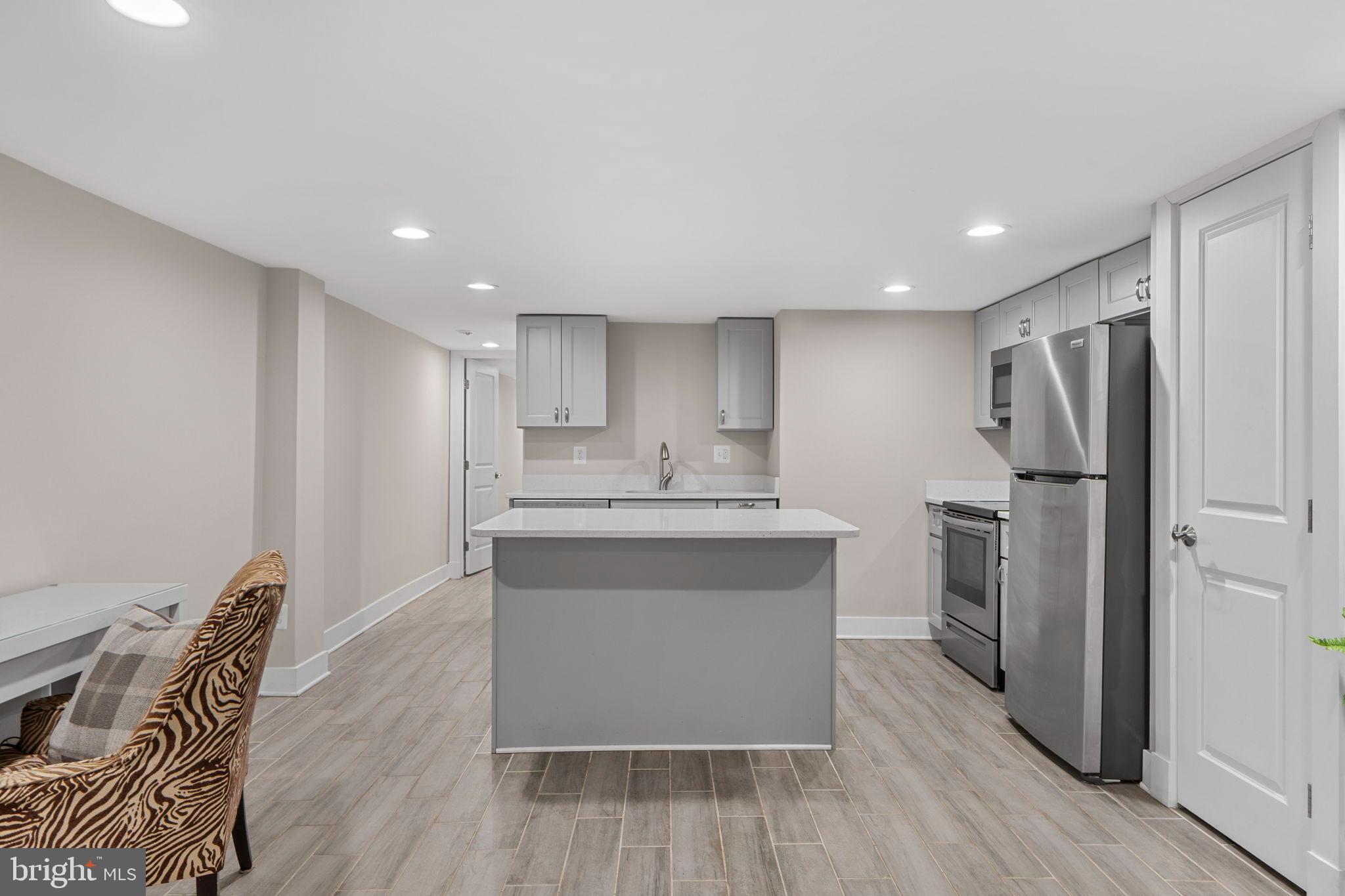 113 R Street Northeast Washington, DC 20002 - Photo 35 of 46 Modern kitchen with sleek finishes.