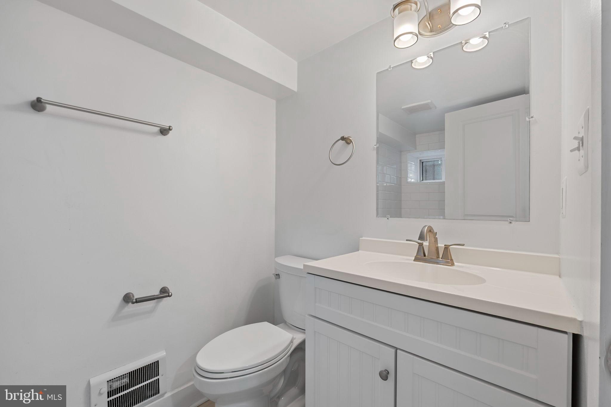 113 R Street Northeast Washington, DC 20002 - Photo 37 of 46 full bathroom with sleek finishes at lower level