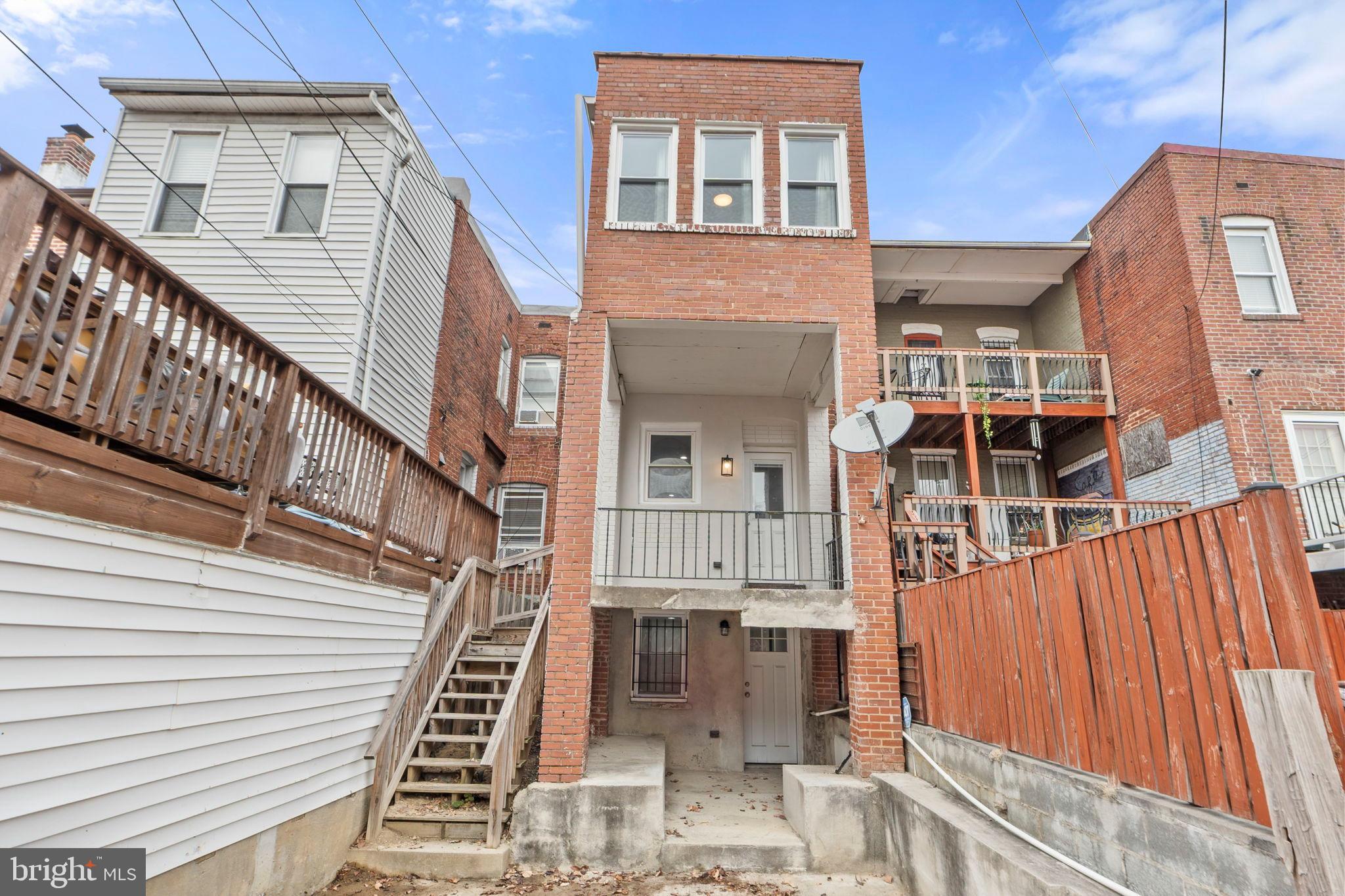113 R Street Northeast Washington, DC 20002 - Photo 41 of 46 Charming brick duplex with inviting balconies.