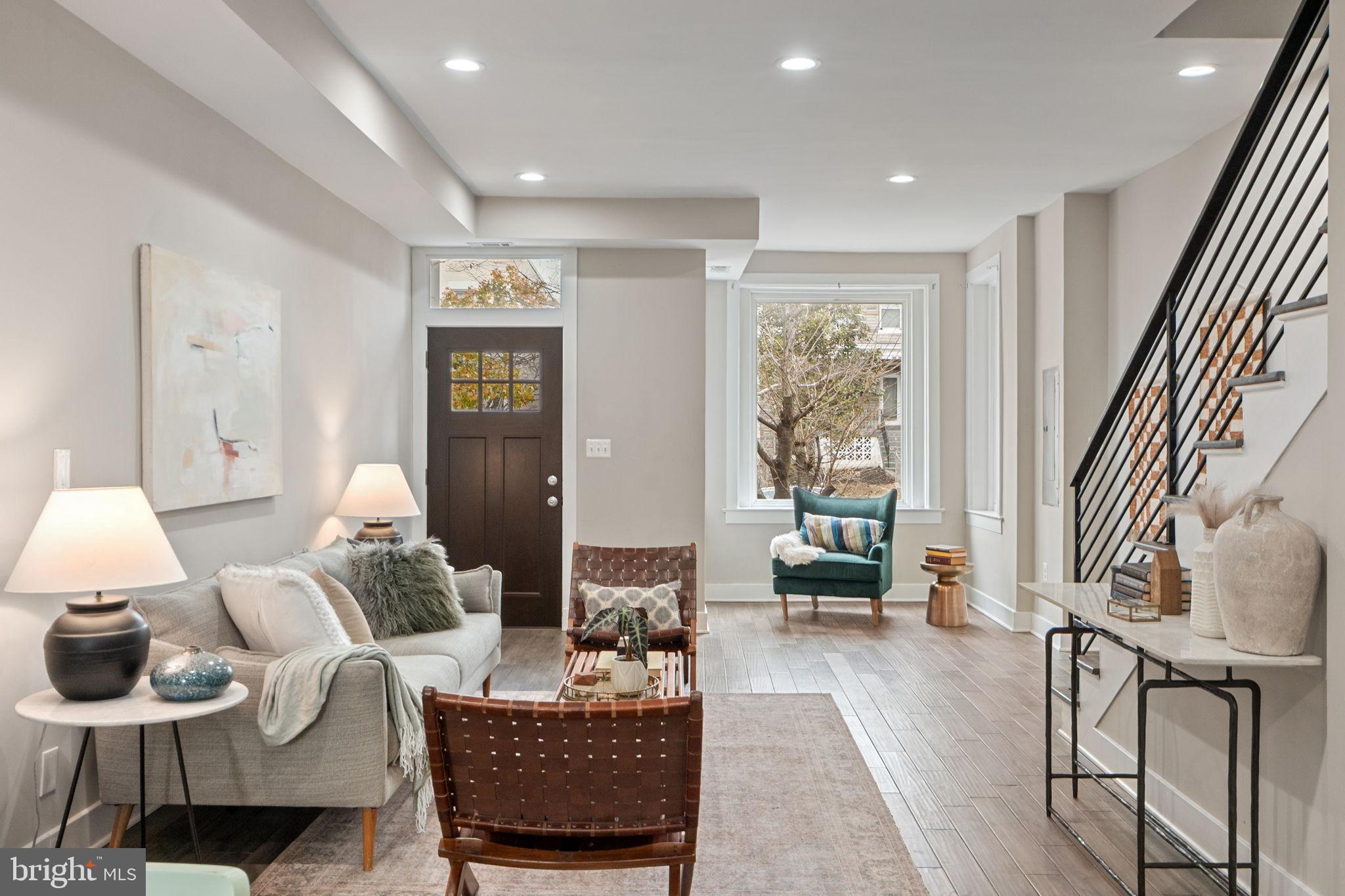 113 R Street Northeast Washington, DC 20002 - Photo 7 of 46 Modern elegance meets inviting warmth.