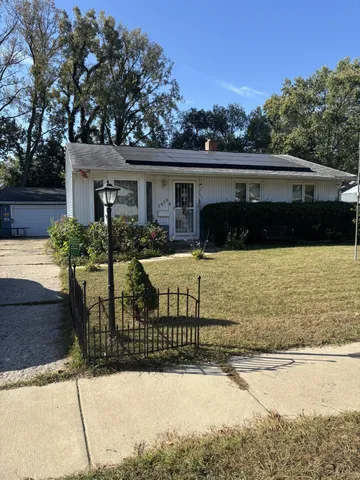 a view of house with outdoor space