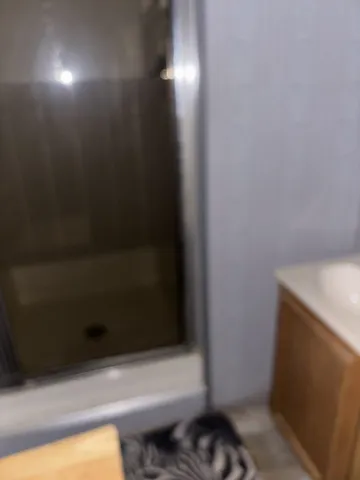 a kitchen with a stove and a refrigerator