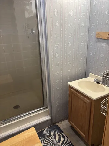 a view of a porch with furniture and gym equipment