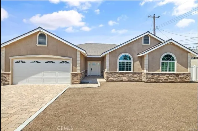 a house view with a outdoor space