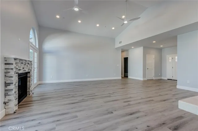 a kitchen with cabinets and window
