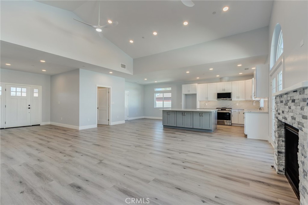 11128 Stamy Road Whittier, CA 90604 - Photo 17 of 40 a view of kitchen and hall with wooden floor