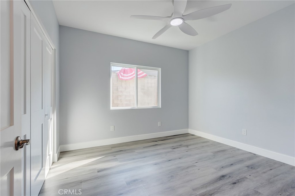 11128 Stamy Road Whittier, CA 90604 - Photo 25 of 40 wooden floor in an empty room with a window