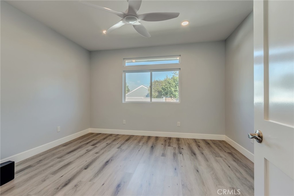 11128 Stamy Road Whittier, CA 90604 - Photo 36 of 40 wooden floor in an empty room with a window