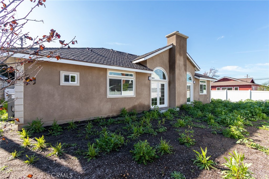 11128 Stamy Road Whittier, CA 90604 - Photo 39 of 40 a view of a house with a yard and plants